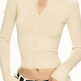 Rövid, kötött kardigán