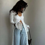 Hosszú ujjú, bő kötött strandmellény