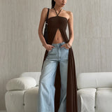 Karcsú, letisztult és sokoldalú blúz hátul nélküli hasítékkal