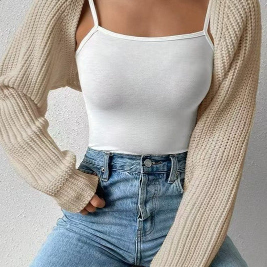 Hosszú ujjú, bordázott kötésű mellény