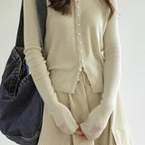 Elegáns gyapjú kötött mellény