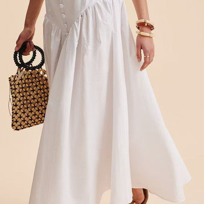Elegáns fehér maxi szoknya magas derekú és foltvarrásos gombokkal