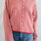 Csíkos kötött mellény kerek nyakkal
