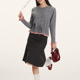 Karcsúsított kötött mellény panelekkel és testhezálló derékkal