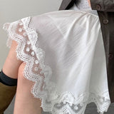 Elegáns és divatos aszimmetrikus midi szoknya csipkebetétekkel