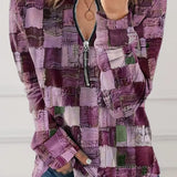 Dóra - Kockás Cipzáros Felső