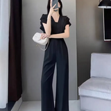 Női overál – V-nyakú – fodros ujjú – elegáns, laza szabású