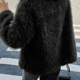 Puha és bolyhos, hosszú ujjú, lezser kabát