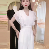 Női overál – V-nyakú – fodros ujjú – elegáns, laza szabású