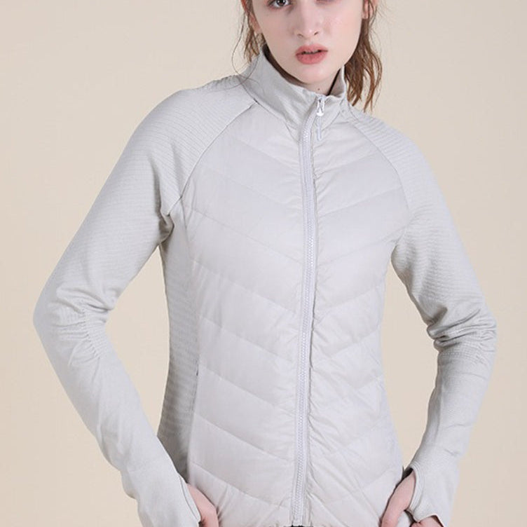 Könnyű, testhezálló pehelykabát magas gallérral, szélálló sportdzseki