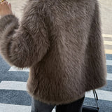 Puha és bolyhos, hosszú ujjú, lezser kabát