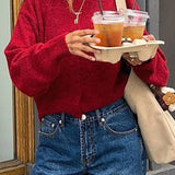 Rövid, gombos kötött kardigán