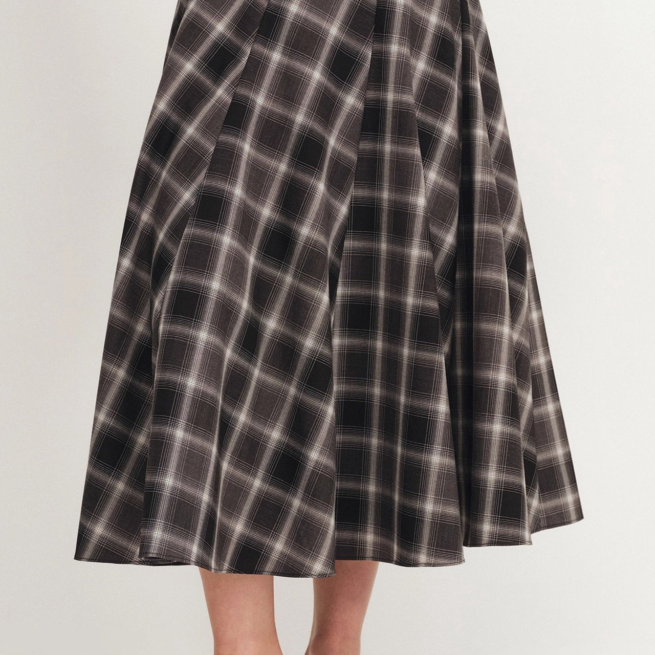 A-vonalú, kockás gyapjúszoknya, hangsúlyos derékkal