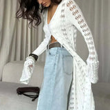 Hosszú ujjú, bő kötött strandmellény