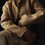 Flitteres kabát magas gallérral és zsebekkel