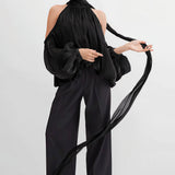 Hosszú ujjú, váll nélküli blúz egyedi dizájnnal