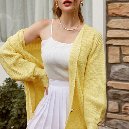 Egyszínű, lezser kötött mellény