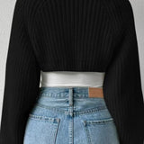 Hosszú ujjú, bordázott kötésű mellény