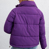 Puffos dzseki rövid, magas gallérral