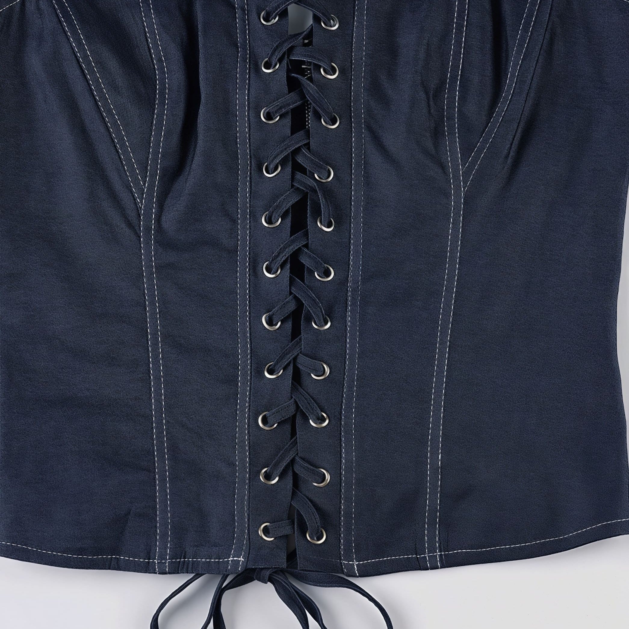 Egyszínű kötött rakott szoknya és megkötős szett alacsony derekú részletekkel