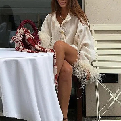 Elegáns kardigán tollszegéllyel