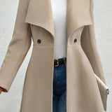 Hosszú, öves gyapjúkabát