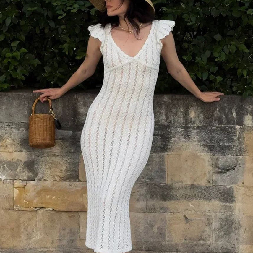 Hosszú, vidéki stílusú kötött ruha V-nyakkal és francia fodros díszítéssel