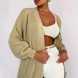 Egyszínű, lezser kötött mellény