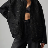 Flitteres kabát magas gallérral és zsebekkel