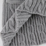 Kábelmintás kötött szoknya pomponnal