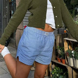 Rövid, gombos kötött kardigán