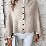 Női poncsó – puha kötésű – laza szabású – gombos záródású – bordázott felülettel