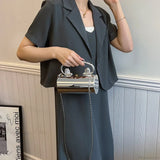 Hengeres akril válltáska, estélyi clutch