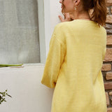 Egyszínű, lezser kötött mellény