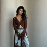 Hosszú ujjú, bő kötött strandmellény