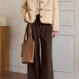 Elegáns kabát kétszínű texturált gyapjúból