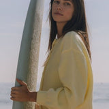 Laza, egyszerű kötésű kardigán hosszú, gombos ujjakkal