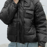 Élénk színű pufi kabát magas gallérral