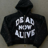 Kényelmes cipzáras kapucnis pulóver grafikus mintával