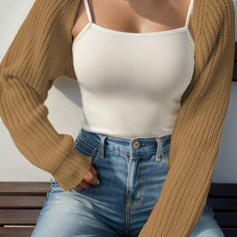 Hosszú ujjú, bordázott kötésű mellény