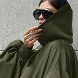 Egyedi, túlméretezett és karcsú, kétrészes retró zöld ballonkabát