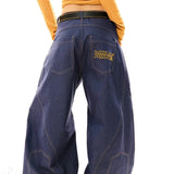 Hosszú, bő szárú, ívelt, drapézott farmernadrág