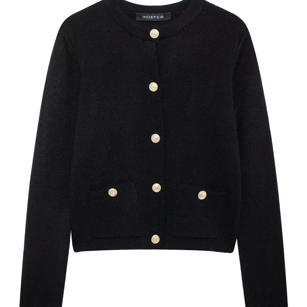 Rövid kötött mellény zsebekkel