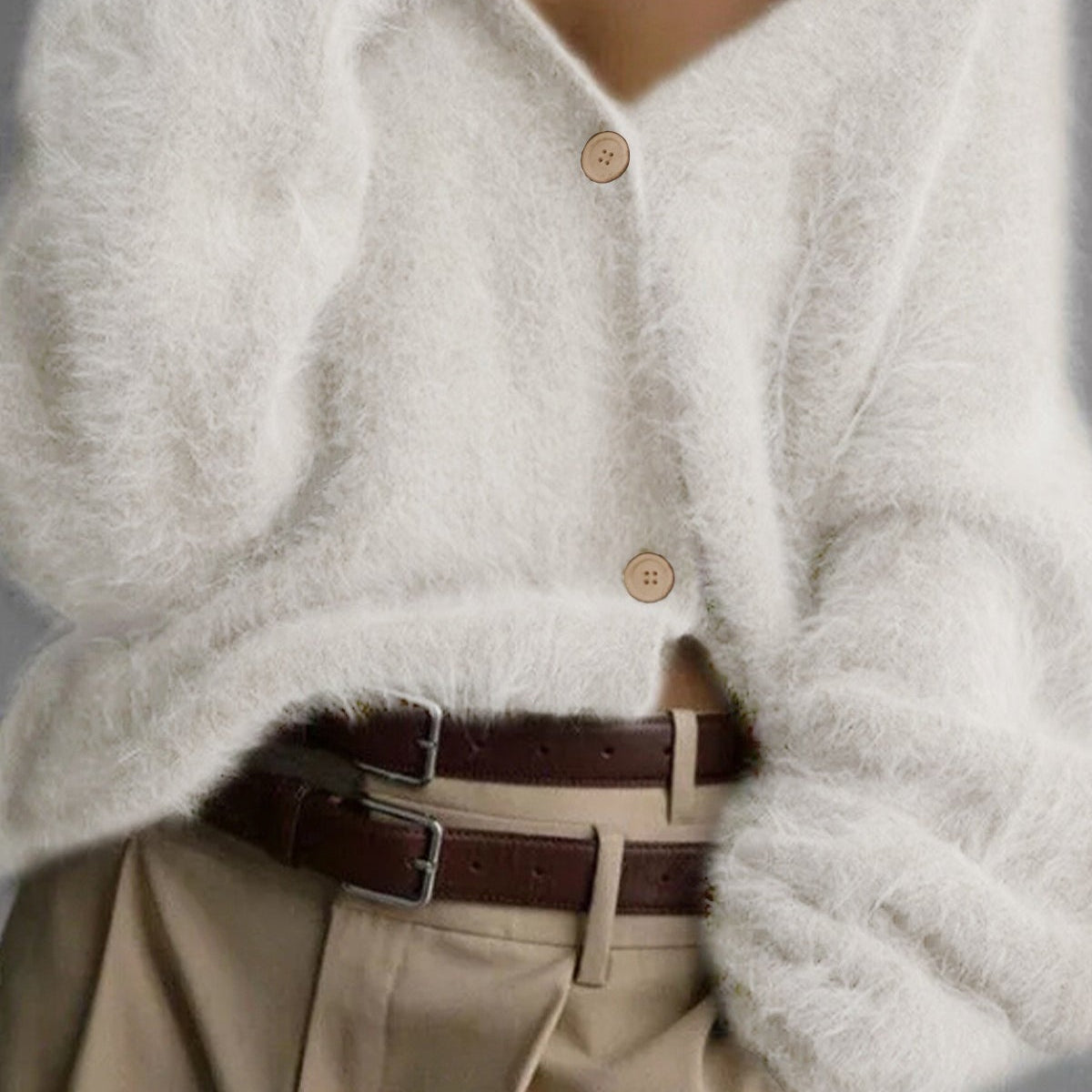 Hosszú ujjú, gombos mellény V-nyakkal