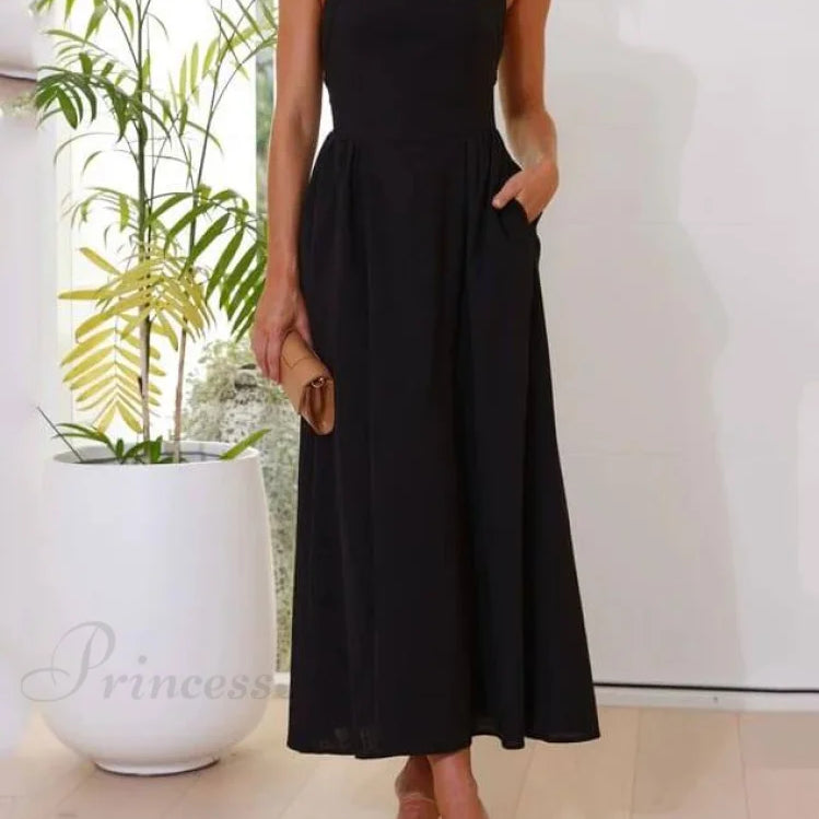 Elegáns fekete midi ruha pántnélküli nyakkal és alacsony derekú szabással