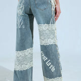 Elegáns, egyenes szárú farmer alacsony derekú, csipkebetétes anyaggal