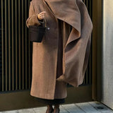 Női kétsoros kabát hajtókával, városi stílus