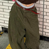 Földig érő, bő szabású, kifakult farmer